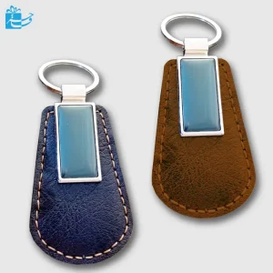 جاکلیدی چرم مشکی و قهوه ای با یراق فلزی و پلاک دو طرفه L-35